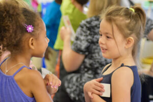 Two kindergarten students meeting