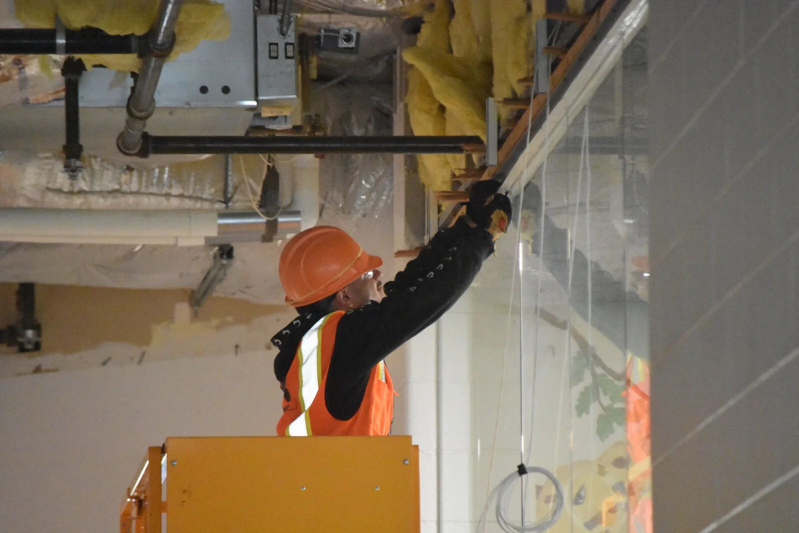 Construction worker on lift
