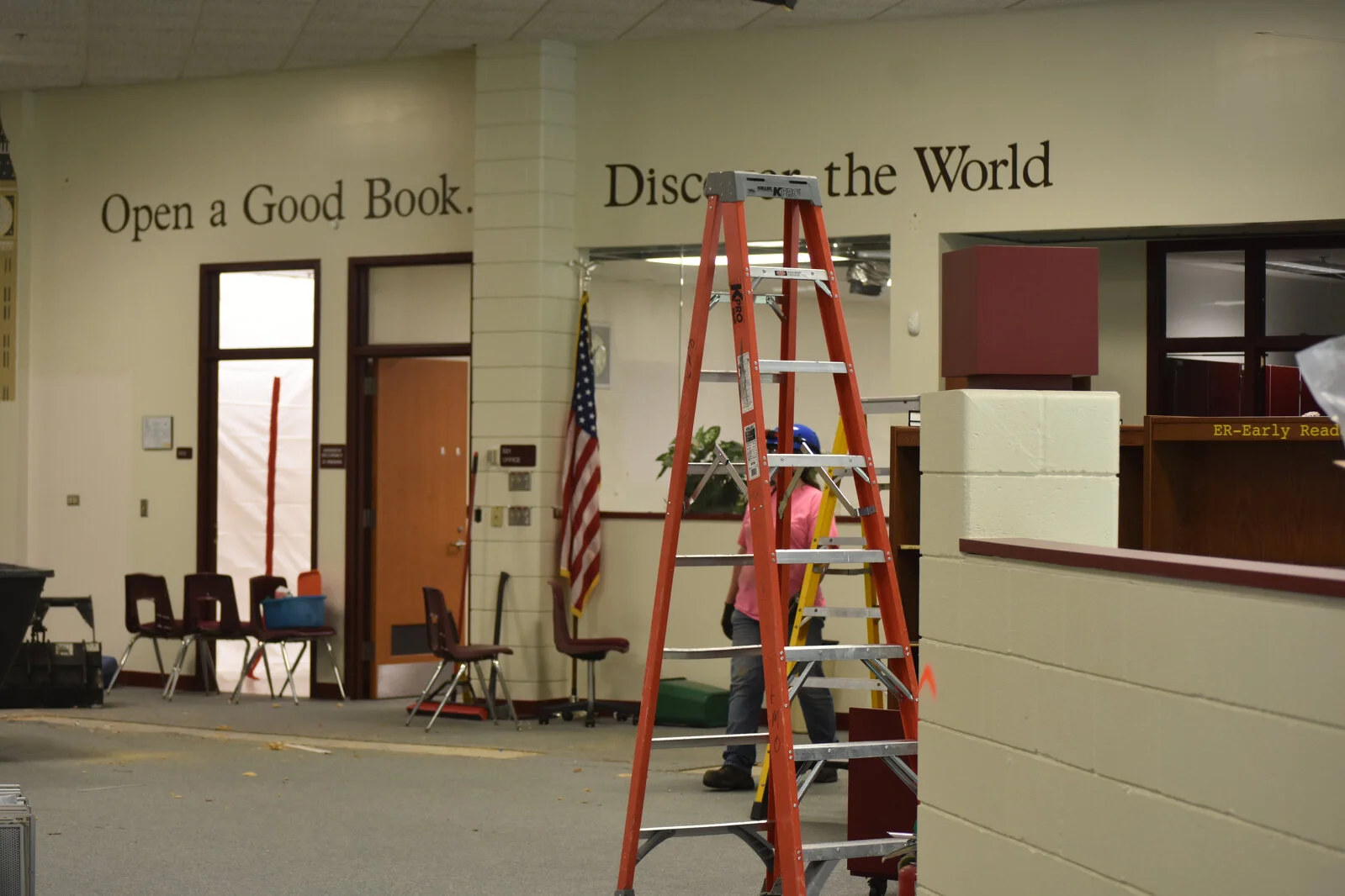 Ladder set up in semi empty library