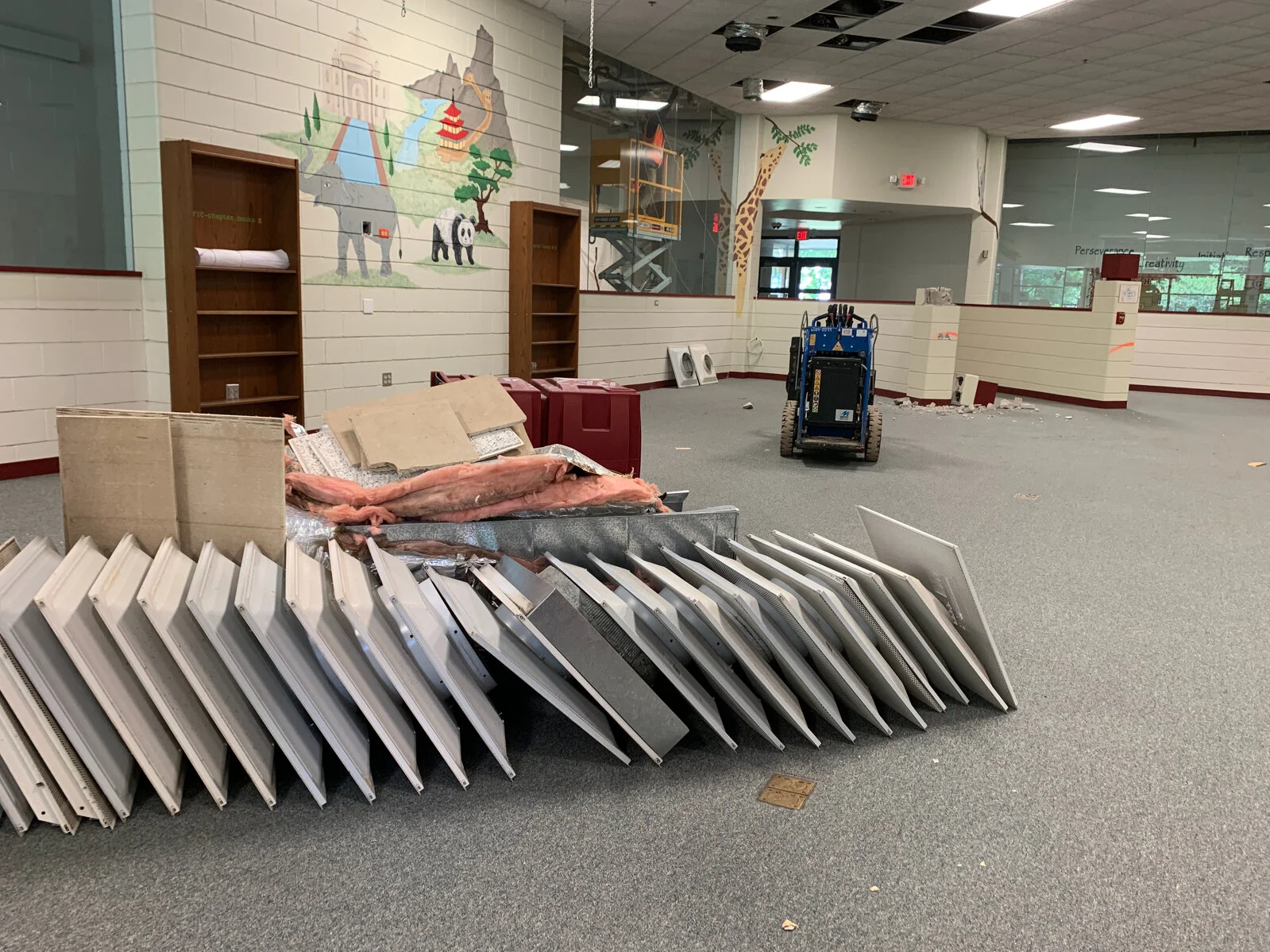 ceiling vents stacked on floor