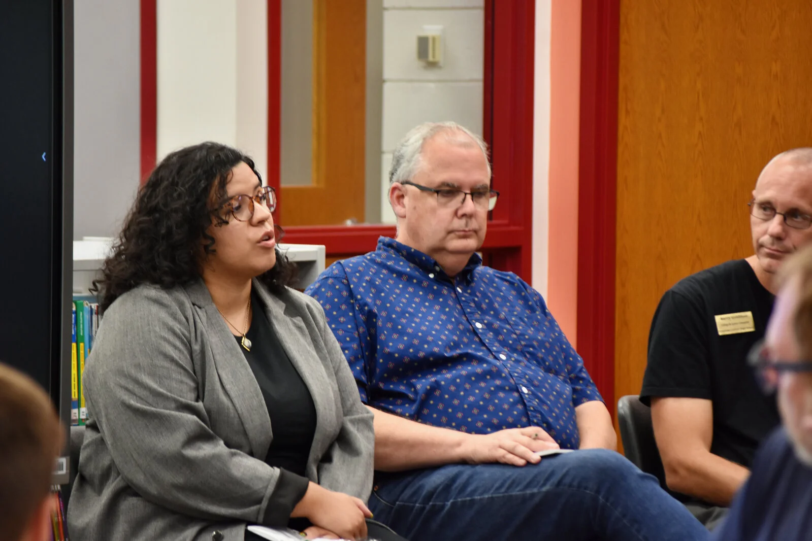 Panelists address the committee at the Portrait of a Learner team meeting
