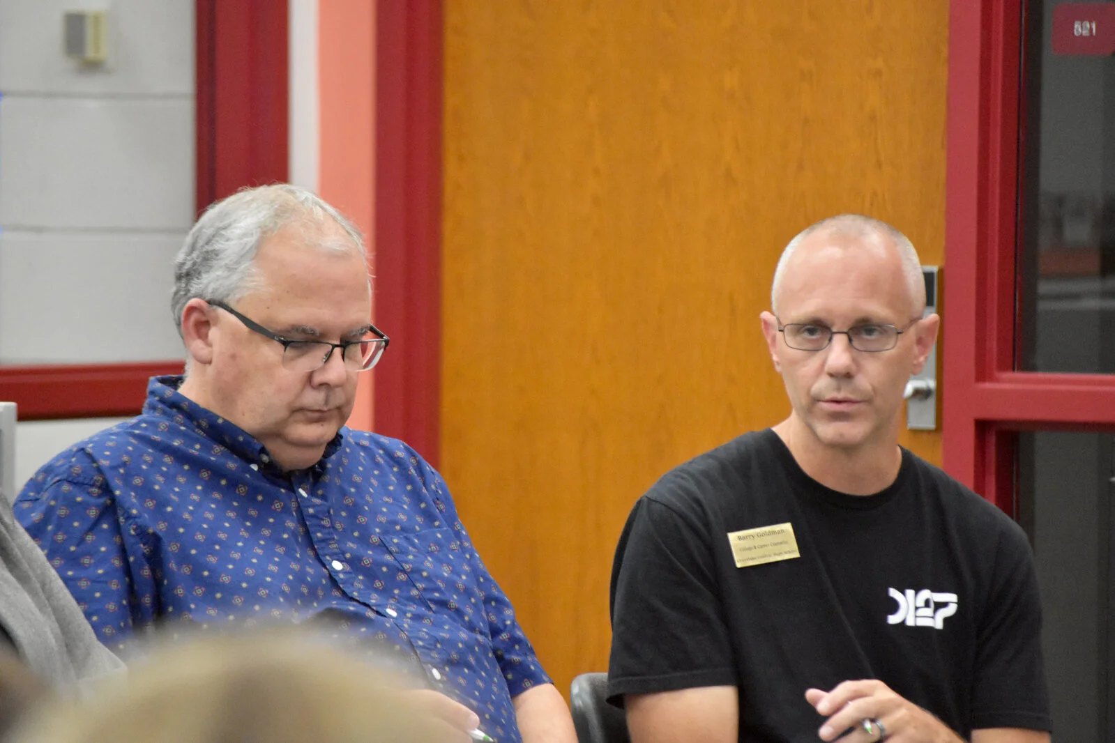 Panelists address the committee at the Portrait of a Learner team meeting